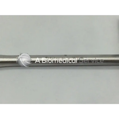 Silver metallic Synthes 355.15 cannulated socket wrench with engraved text and a spherical decorative element