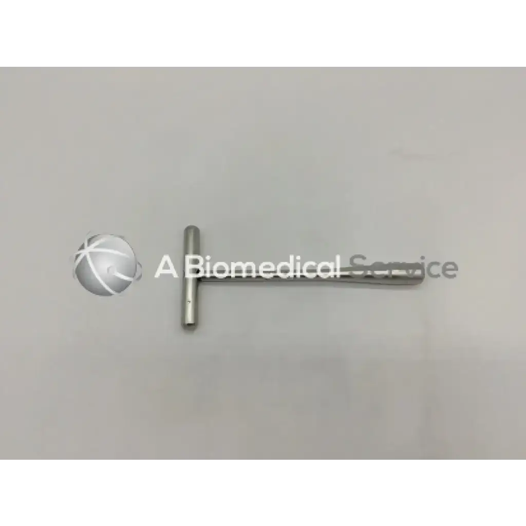 Silver t-shaped synthes 355.15 cannulated socket wrench with polished metallic finish for surgical use