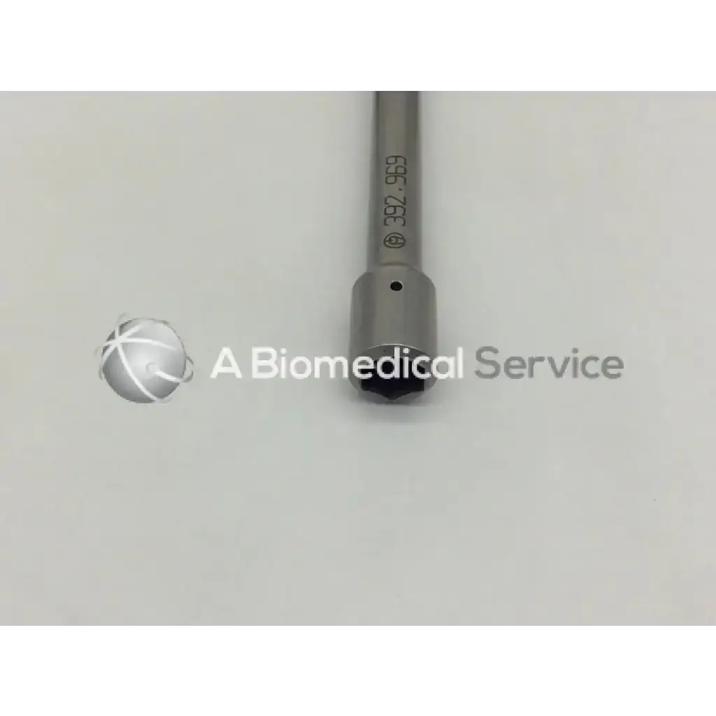 Synthes 392.969 combination wrench 4mm with metallic shaft and rounded black-tipped end for precise fastening