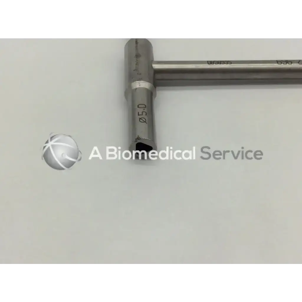 Stainless steel synthes combination wrench 4mm with t-shaped handle and engraved markings for precise use