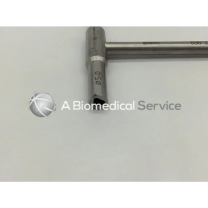 Stainless steel synthes combination wrench 4mm with t-shaped handle and engraved markings for precise use