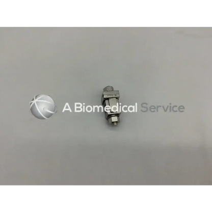 A metallic silver syntheses 393.64 external fixation adjustable clamp orthopedic with hexagonal head and threaded ends