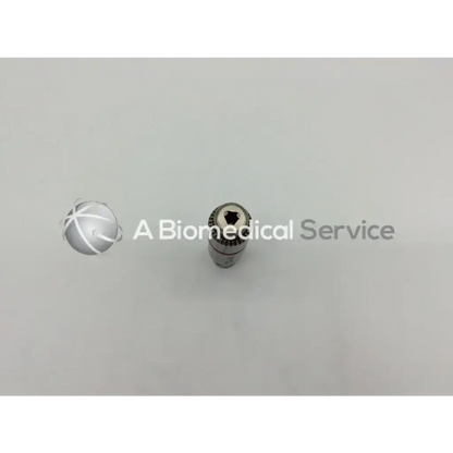 Silver metallic synthes 4100-231 1/4 reamer attachment with hexagonal drive and textured grip for surgical use