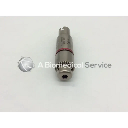 Silver Synthes 4100-231 1/4 inch reamer attachment with red band, textured grip, and engraved markings for precision use