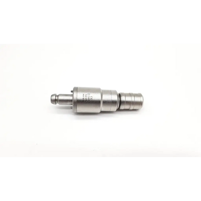 Silver metallic dental handpiece synthes 532.015 dhs dcs attachment 1015 with cylindrical body and threaded ends