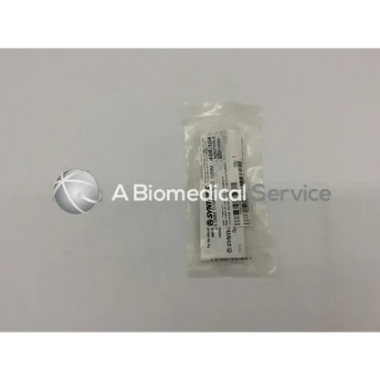 A sterile clear plastic-wrapped synthes hard rod 100mm medical device with barcode and product code 496104