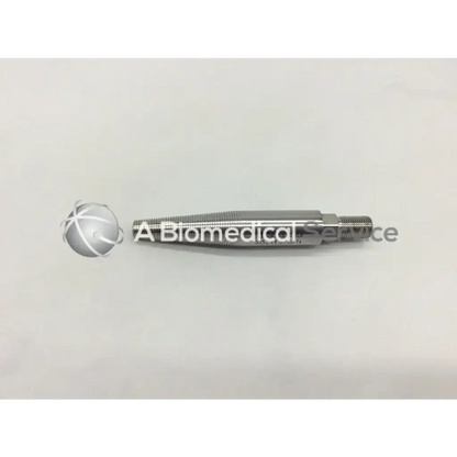 Silver metallic synthes bolt conical with threaded shaft and spherical head for universal tibial nails 11-15mm diameter