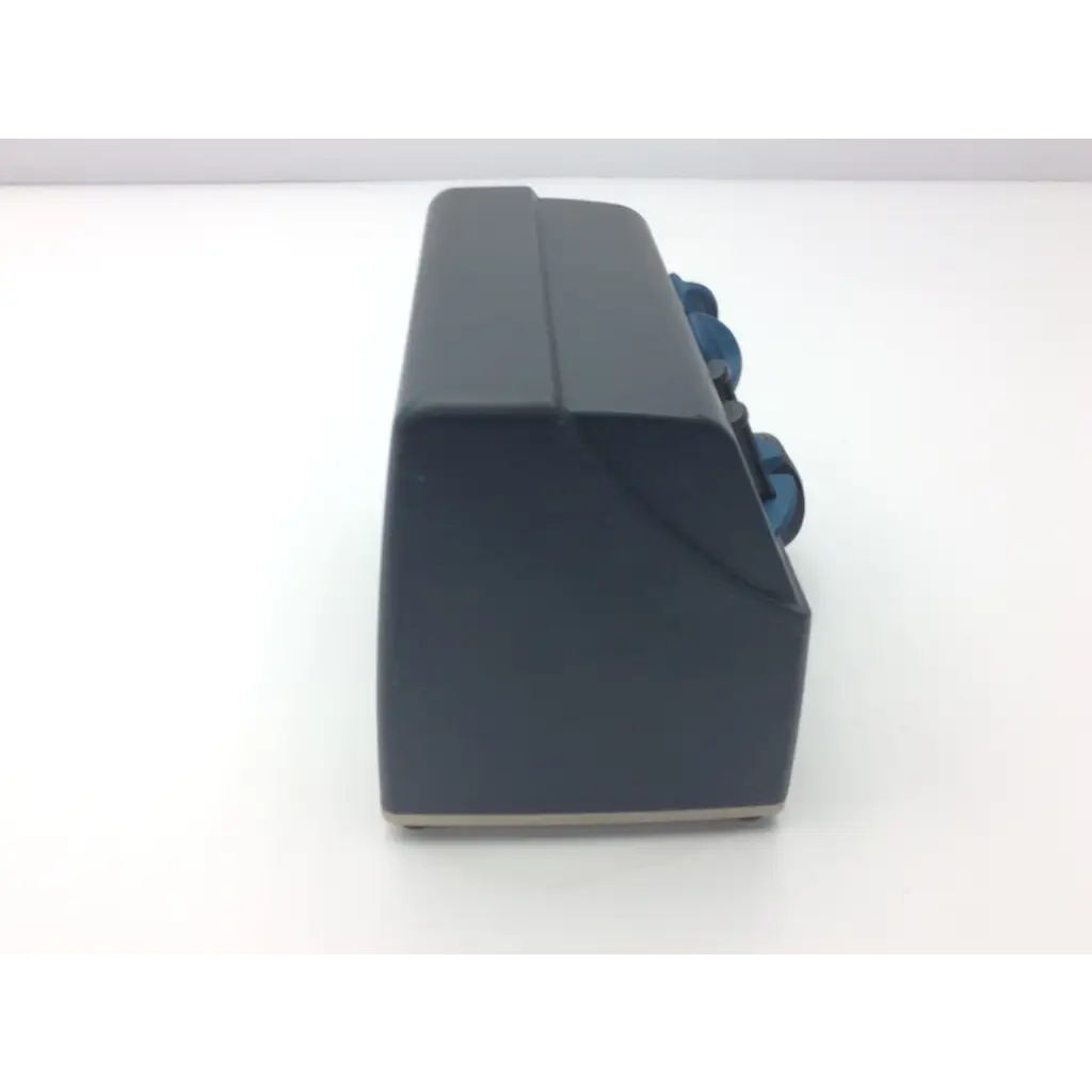Dark gray plastic synthes electric pen drive console with blue circular components for neurosurgery drill use