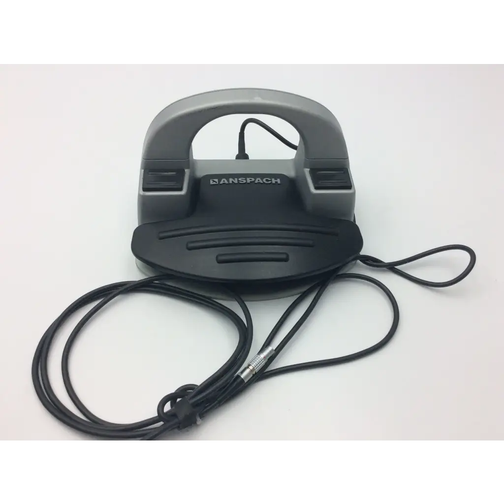 Gray and black ansprech handheld device with coiled cable in synthes electric pen drive console for neurosurgery use