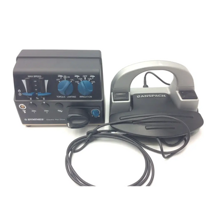 Black and silver anspach dental handpiece with blue knobs and coiled cord for synthes electric pen drive console use