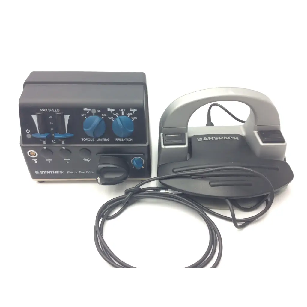 Black and silver anspach dental handpiece with blue knobs and coiled power cord in synthes electric pen drive console for neurosurgery