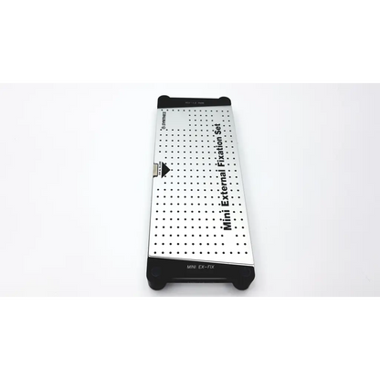 Synthes mini external fixation set silver metallic with black plastic ends and a grid of evenly spaced holes