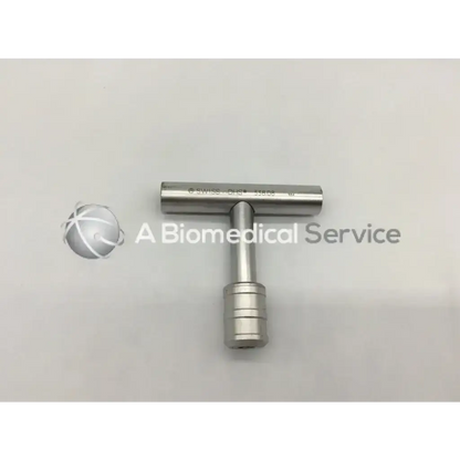 Silver synthes swiss dhs t-handle surgical instrument with engraved markings and textured grip for precision use