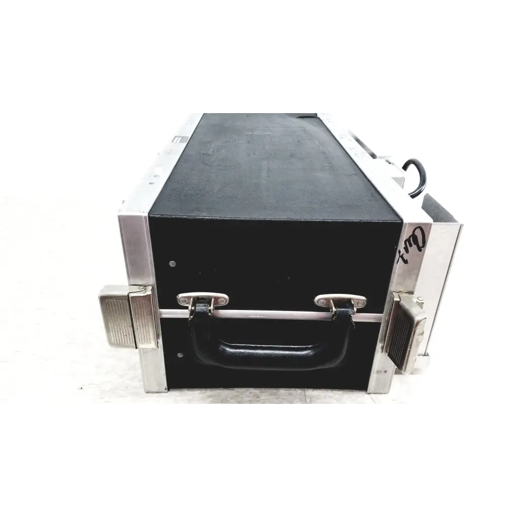 Black hard-shell flight case with silver aluminum edges and rubberized handle for systron donner mrc 6500 microwave repeater test set