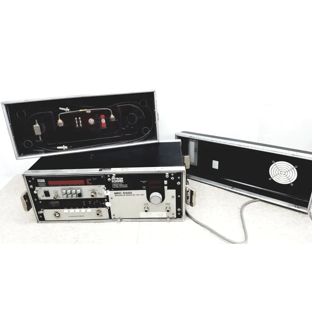 Silver and black systron donner mrc 6500 microwave repeater test set with metallic finish, knobs, dials, and ports