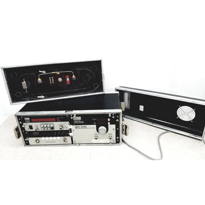 Silver and black systron donner mrc 6500 microwave repeater test set with metallic finish, knobs, dials, and ports