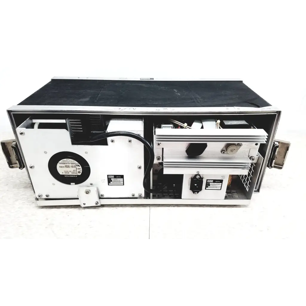 Silver industrial-grade systron donner mrc 6500 microwave repeater test set with visible internal components and cooling fan