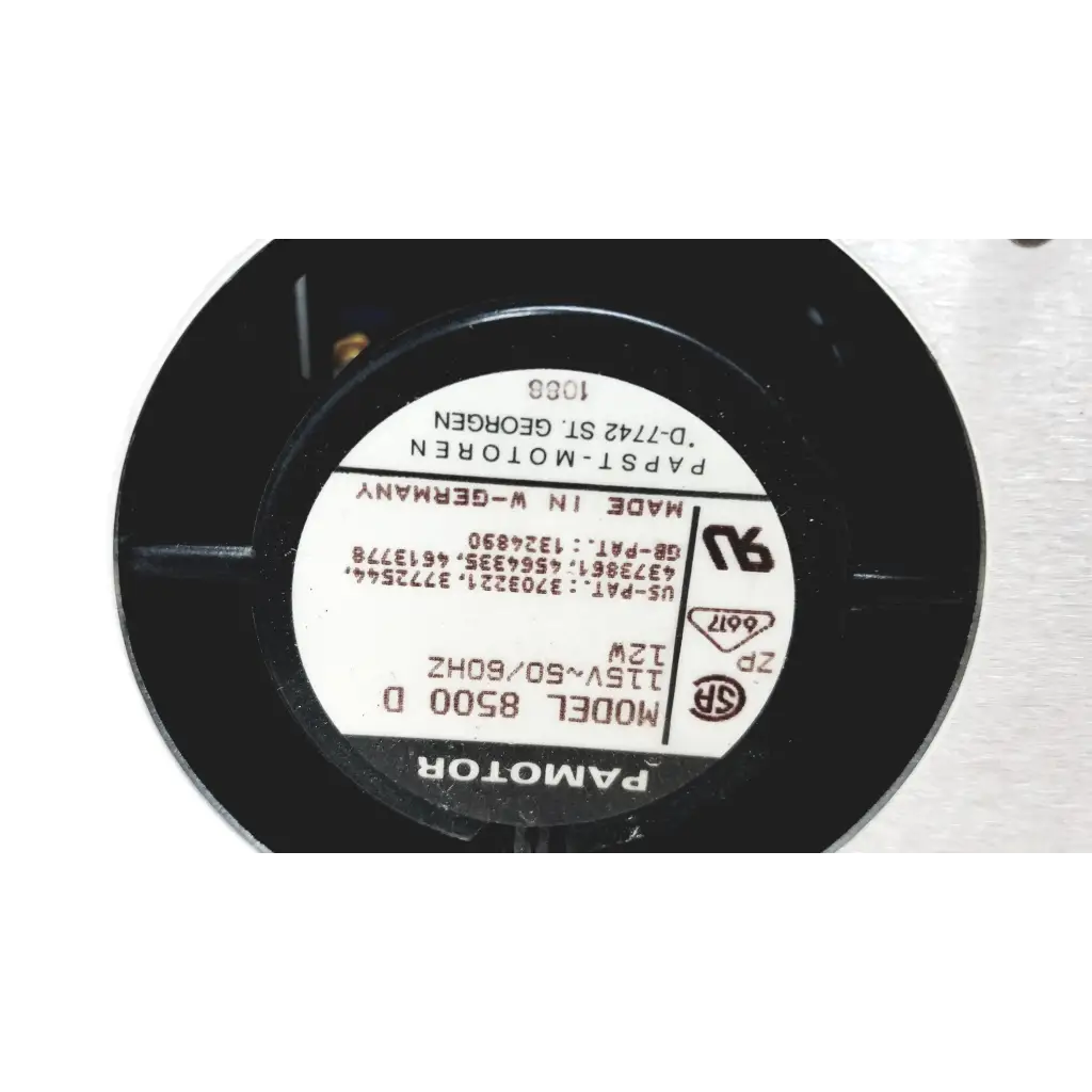 Black circular pamotor model 8500 d speaker with white label showing specs on systron donner mrc 6500 microwave repeater test set