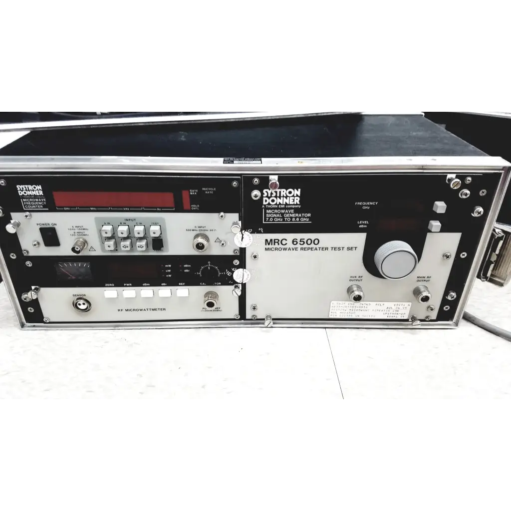Systron donner mrc 6500 microwave repeater test set in black silver metal with knobs ports and red display for repeater test