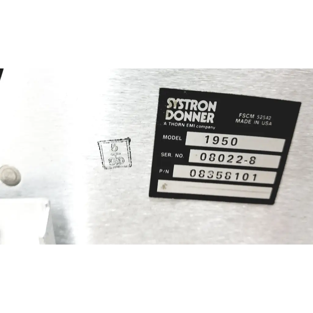 Black label with white text identifying systron donner model 1950 made in usa on microwave repeater test set back panel