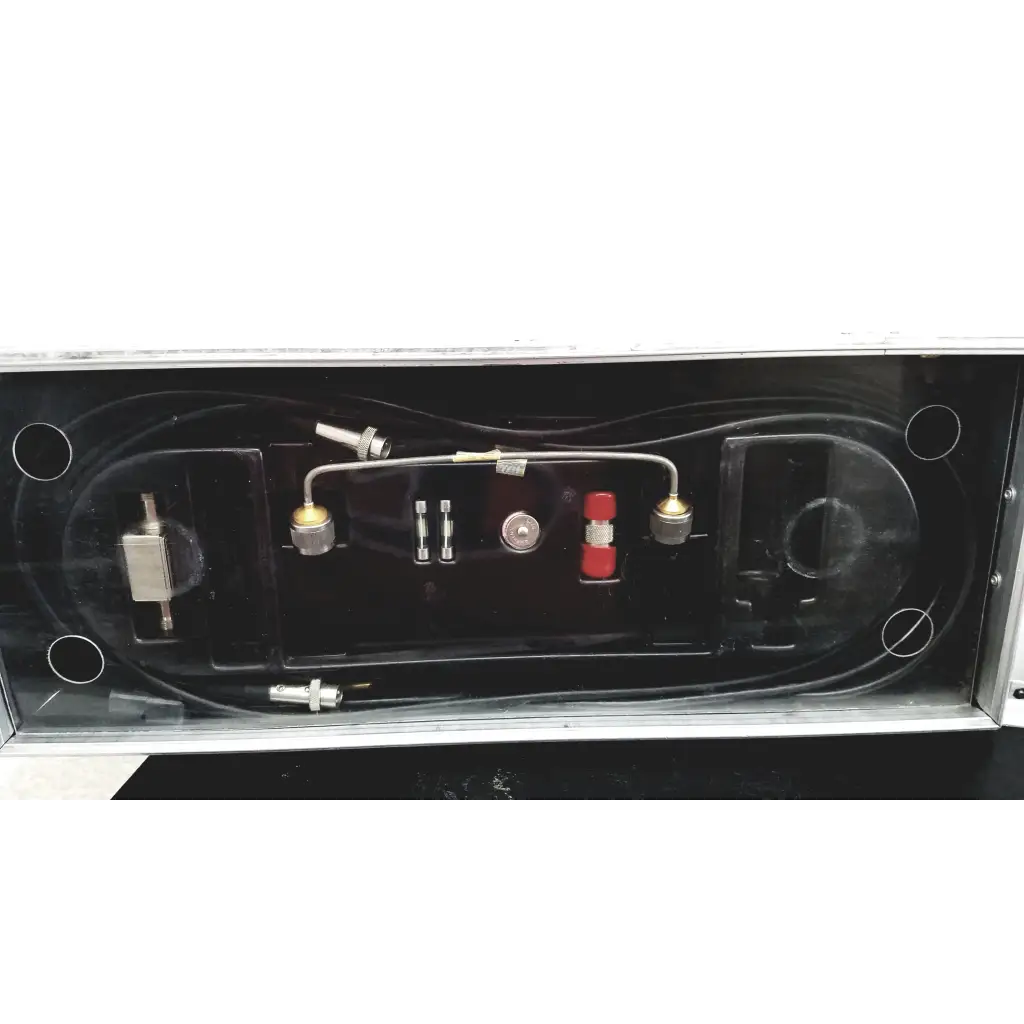 Black plastic case with metallic and red refrigeration tools for systron donner mrc 6500 microwave repeater test set