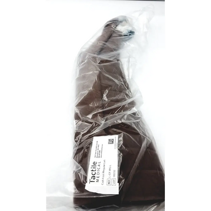 Brown calf foot regular left packaged in clear plastic with white tactile medical label for foot regular use