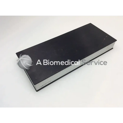 Black rectangular Tandberg TTC7-14 Edge 95 MXP video conference system with silver edges and small spherical component