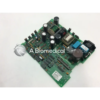 Green printed circuit board with black capacitors and blue component on tectrol tc33m-6806 board model tc33m-6806