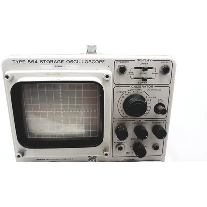 White metal tektronix 564 storage oscilloscope with black knobs and grid-lined display features 3a1 dual trace functions