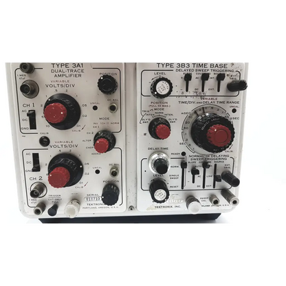 White tektronix 3a1 dual trace storage oscilloscope with red and black knobs for precise signal analysis