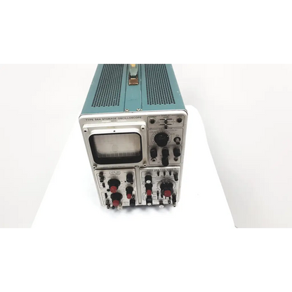 Tekronix 564 storage oscilloscope 3a1 dual trace in vintage teal and silver with perforated top panel and analog screen