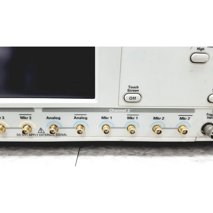 White Tektronix awg7122c arbitrary waveform generator with gold bnc connectors labeled for channels and markers