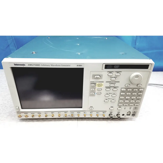 White tektronix awg7122c arbitrary waveform generator with black screen gold input connectors and multiple control buttons
