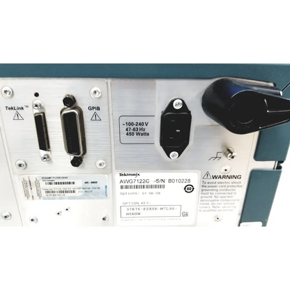 Rear view of tektronix awg7122c arbitrary waveform generator with silver metallic panel and multiple connectors