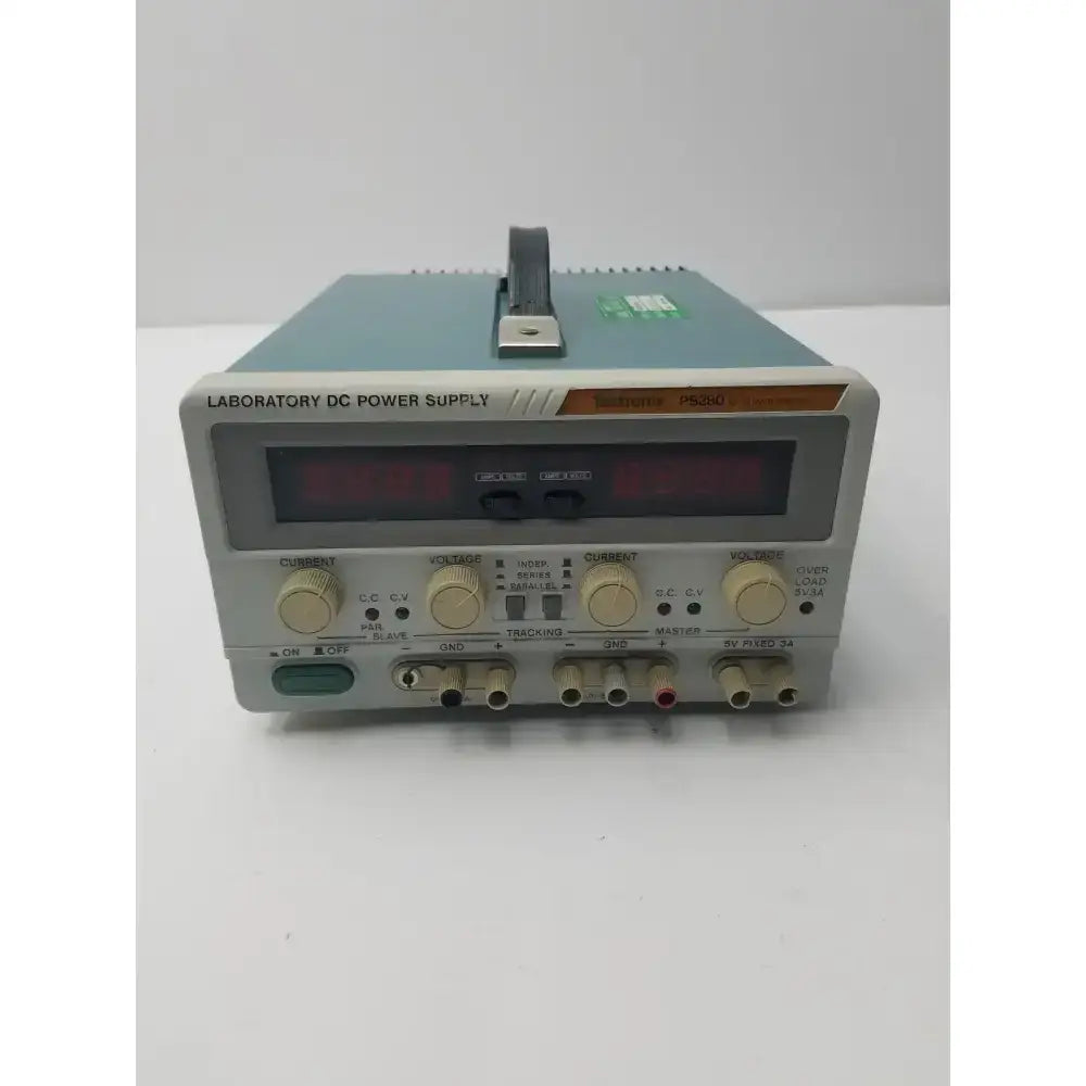 Tektronix ps280 triple output dc power supply in gray and teal with digital display control knobs and multiple output ports