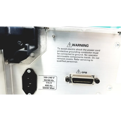 Back panel of silver metallic tektronix rsa6106a real-time spectrum analyzer with black power socket and gpib connector