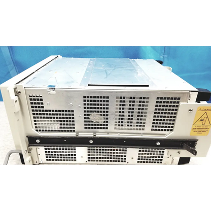 White metal tektronix rsa6106a real-time spectrum analyzer rack with black ventilation grilles and yellow warning label