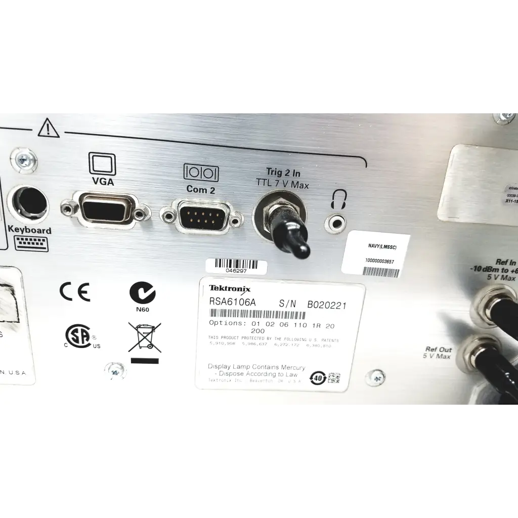 Silver metallic tektronix rsa6106a real-time spectrum analyzer back with multiple ports and serial number label visible