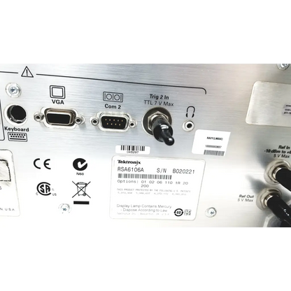 Silver metallic tektronix rsa6106a real-time spectrum analyzer back with multiple ports and serial number label visible