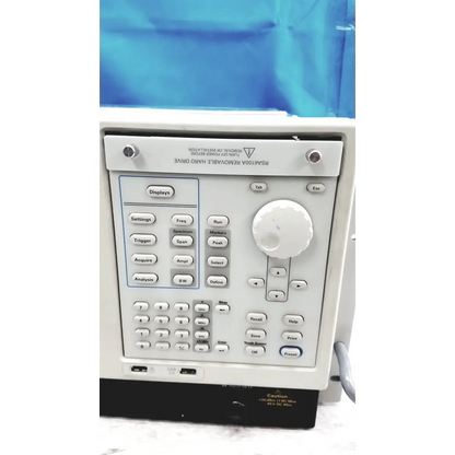 White r&s rsa100a removable hard drive with keypad and rotary dial on tektronix rsa6106a real-time spectrum analyzer