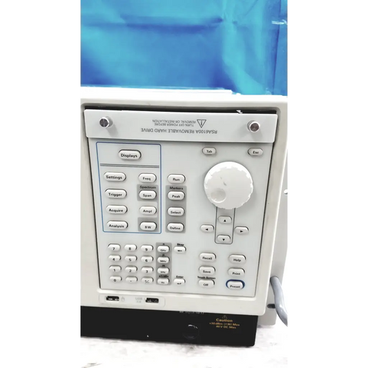 White r&s rsa100a removable hard drive with keypad and rotary dial on tektronix rsa6106a real-time spectrum analyzer