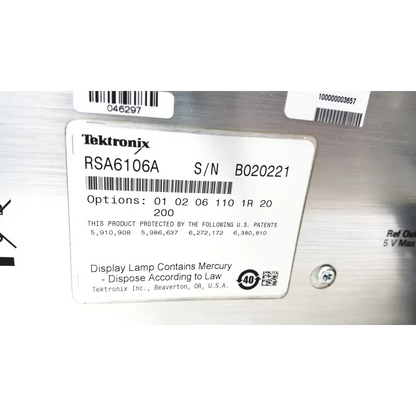 Tektronix rsa6106a real-time spectrum analyzer with metallic silver chassis and serial number b020221 label visible