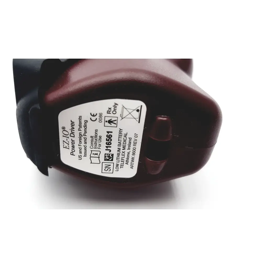 Teleflex arrow ez-io 9058 maroon plastic power driver intraosseous with white label showing product and regulatory info