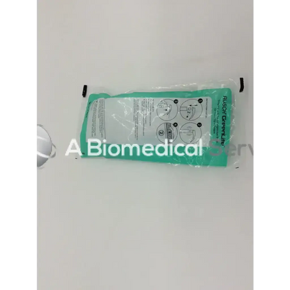 Teal and white packaged rush greenline medical ice pack shown with teleflex rusch green lite metal laryngoscope blade