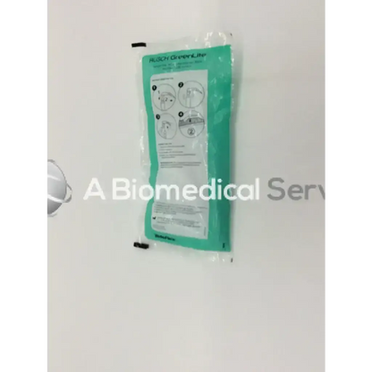 A teal single-use medical glove package with instructions for teleflex rusch green lite metal laryngoscope blade
