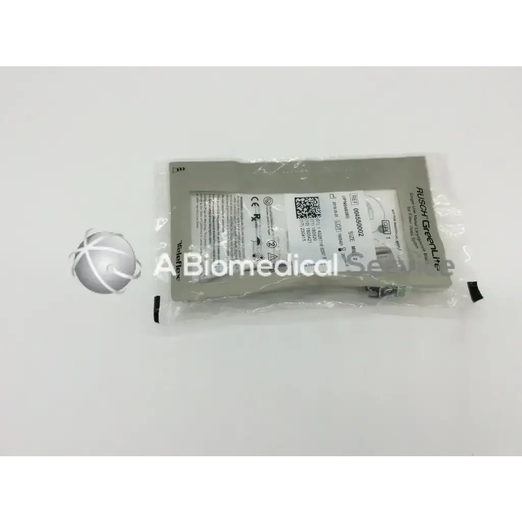 Gray plastic package containing teleflex rush greenlite metal laryngoscope blade for fiber optic system use