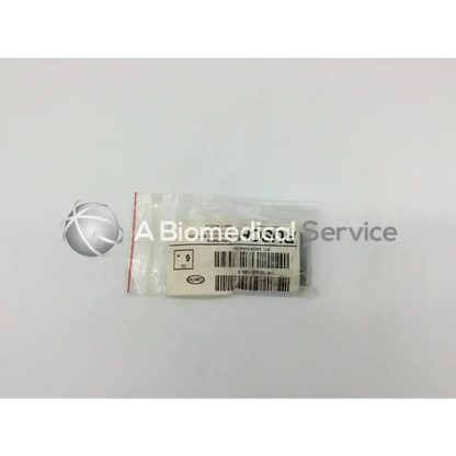 A clear plastic bag containing a teleflex rusch halogen medical lamp with barcode and product information label
