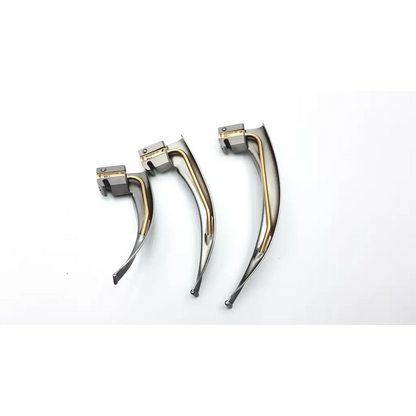 Three metallic teleflex rusch mri laryngoscope handles with curved silver blades and gold conditional fiber optic components