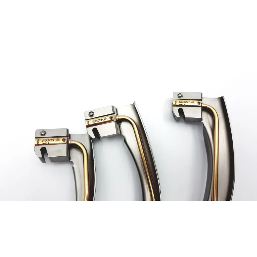 Three teleflex rusch mri laryngoscopes with metallic handles curved blades and gold accents from rusch mri set conditional fiber optic kit