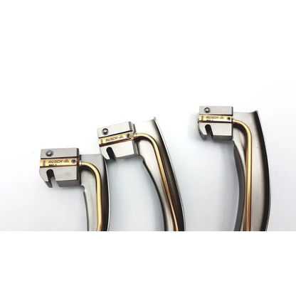 Three teleflex rusch mri laryngoscopes with metallic handles curved blades and gold accents from rusch mri set conditional fiber optic kit